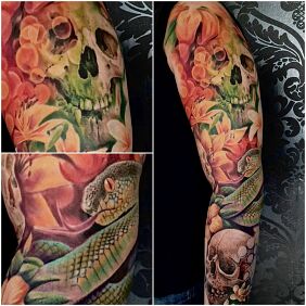 Tattoo Colorful sleeve snake flowers on the upper arm motif: animals style: realistic