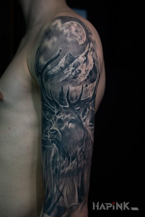 Tattoo Zagojony in black and gray motif and realistic style On the arm