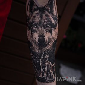 Tattoo Wolf in the forest realism On the arm motif: animals style: realistic