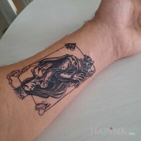Tattoo Playing card On the arm motif: black and gray style: graphic / illustrative