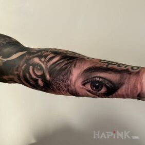 Tattoo Tiger the woman on the forearm motif: faces style: realistic