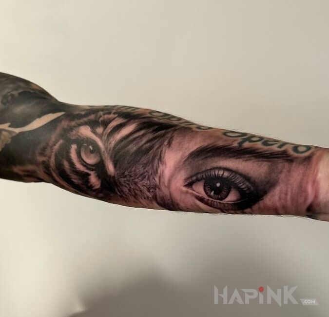 Tattoo Tygrys ta kobieta in animals motif and realistic style On the arm