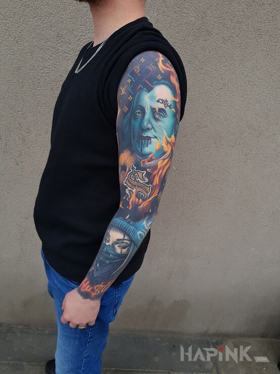 Tattoo Franklin in colorful motif and realistic style on the forearm