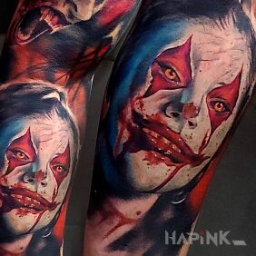 Tattoo Just a little face On the arm motif: faces style: realistic