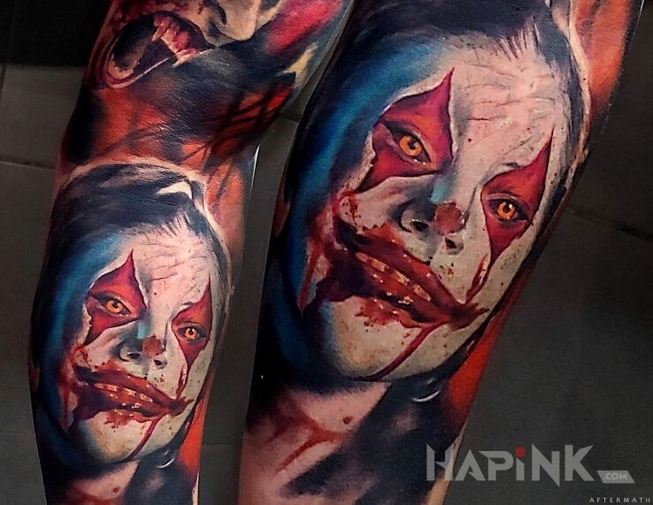 Tattoo Taka tam buźka in dark motif and realistic style On the arm