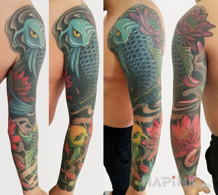 Tattoo Cover in flowers motif and japanese / irezumi style on the bicep