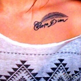 Tattoo Carpe Diem on the collarbone motif: lettering