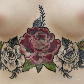 Tattoo Embroidered rose tattoo underboob motif: flowers style: graphic / illustrative