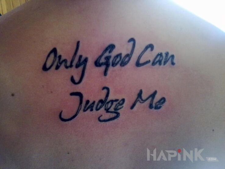 Tattoo God in lettering motif on the back