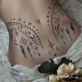 Tattoo Stars on the belly on the stomach motif: black and gray style: minimalistic