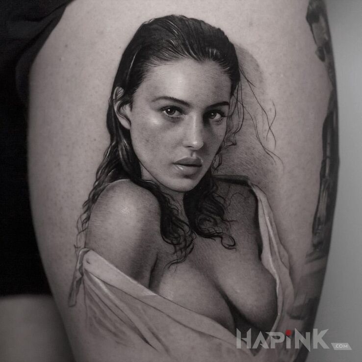 Tattoo Monica Bellucci in black and gray motif and realistic style on the leg