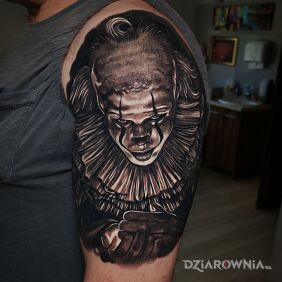 Tatuaż Pennywise na ręce motyw: mroczne styl: realistyczne