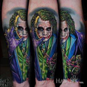 Tattoo Joker on the forearm motif: characters style: realistic