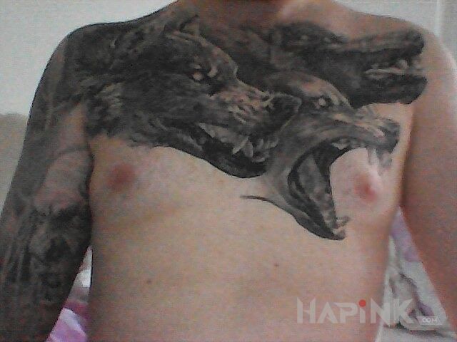 Tattoo Początek klaty in animals motif and realistic style on the chest