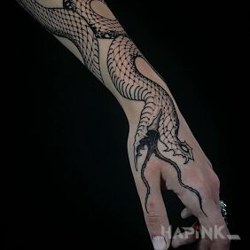 Tattoo Snake on the wrist motif: dark style: graphic / illustrative