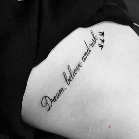 Tattoo Dream, believe and risk on the ribs motif: lettering style: calligraphy