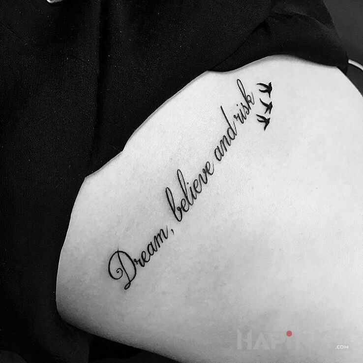 Tattoo Dream, belive and risk in lettering motif and calligraphy style on the ribs