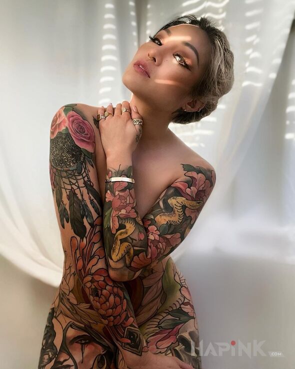 Tattoo Cała w kolorach in animals motif and neo-traditional style On the arm