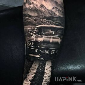 Tattoo By car to the mountains On the arm motif: 3D style: realistic
