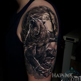 Tattoo Werewolf on the upper arm motif: dark style: realistic