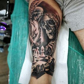 Tattoo Chess game on the thigh motif: demons style: realistic