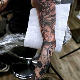 Tattoo Horror movie sleeve On the arm motif: characters style: realistic