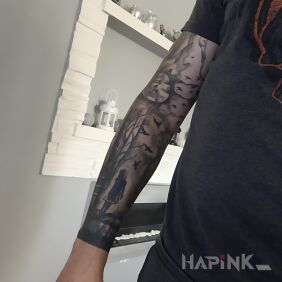 Tattoo Forest on the forearm motif: black and gray style: graphic / illustrative
