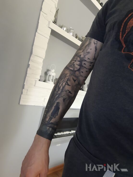 Tattoo Las in dark motif and graphic / illustrative style on the forearm