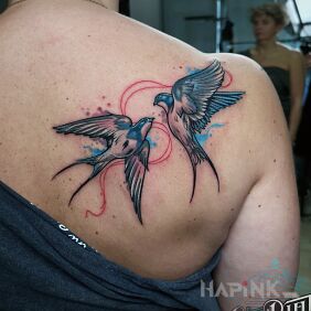 Tattoo Swallows on the back motif: animals style: graphic / illustrative
