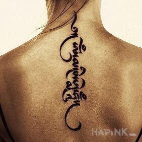 Tattoo Riddle on the back motif: lettering