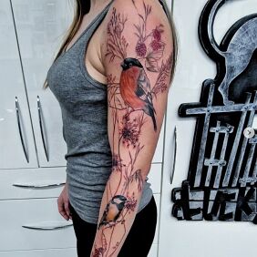 Tattoo Polish birds tit and bullfinch On the arm motif: colorful style: realistic