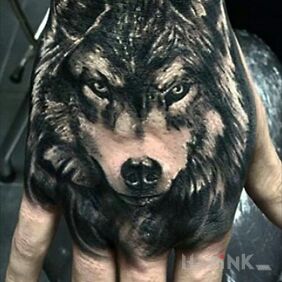 Tattoo Strong on the hand motif: animals style: realistic
