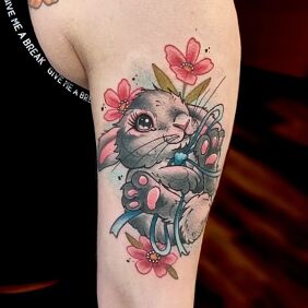 Tattoo Bunny on the upper arm motif: colorful style: graphic / illustrative