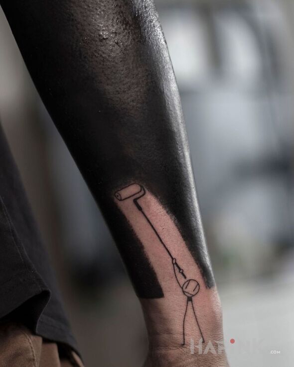 Tattoo Malowanie in black and gray motif and blackwork / blackout style on the forearm