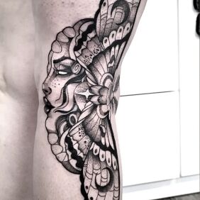 Tattoo Moving moth on the leg motif: black and gray style: graphic / illustrative