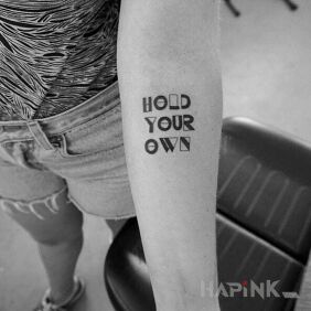 Tattoo Hold your own on the forearm motif: lettering