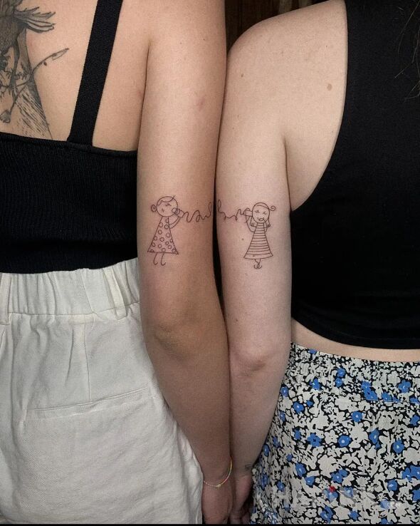 Tattoo Słuchaj kochana 😂 in characters motif and minimalistic style On the arm