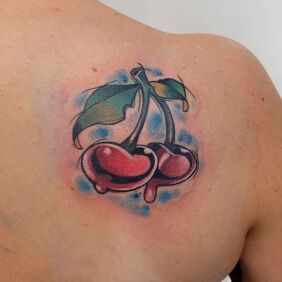 Tattoo Juicy cherry on the back motif: floral style: newschool