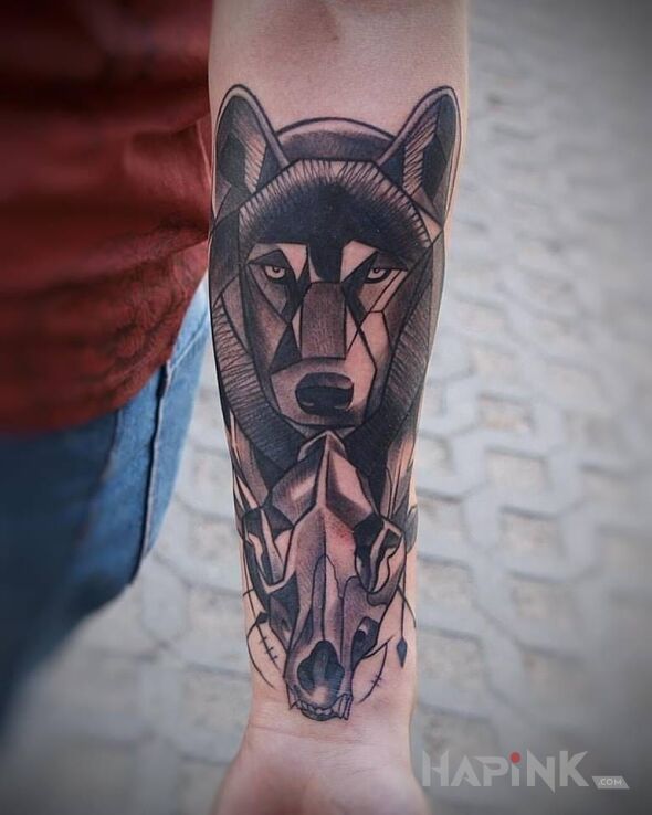 Tattoo Wilk in animals motif on the forearm