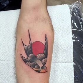Tattoo Swallow On the arm motif: animals style: neo-traditional