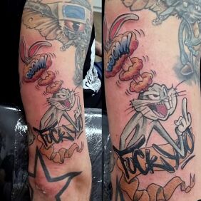 Tattoo Bugs Bunny on the upper arm motif: characters style: cartoon / comic book