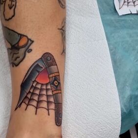Tattoo Razor near the ankle motif: colorful style: oldschool