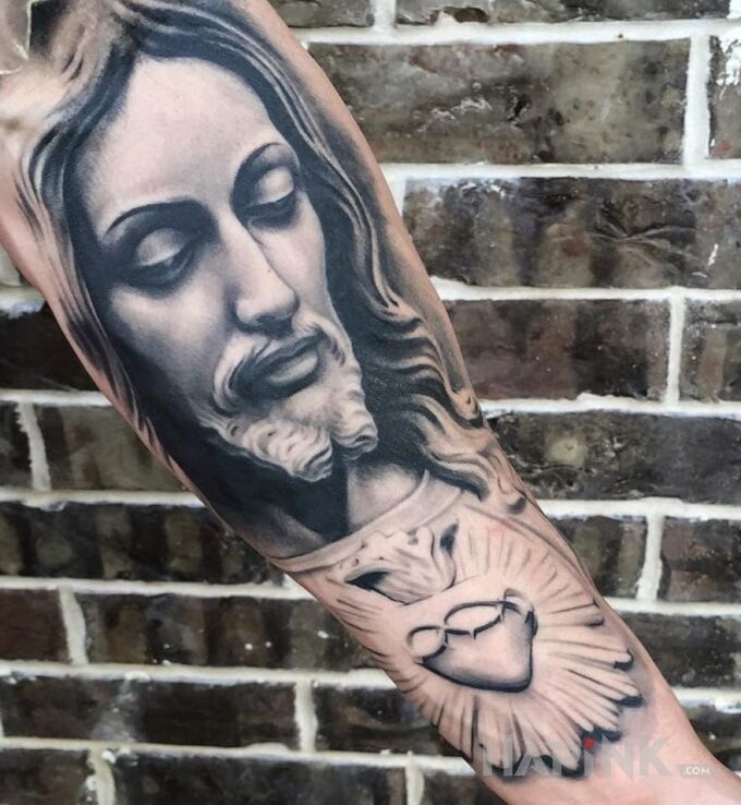 Tattoo Jezus in 3D motif and realistic style on the forearm