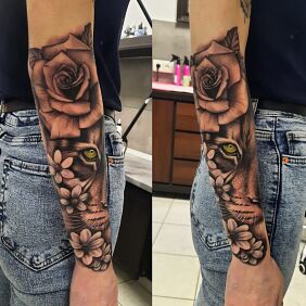 Tatuaż Tygrysica na ręce motyw: czarno-szare styl: realistyczne