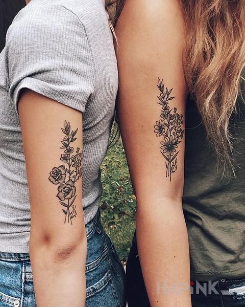 Tattoo Friendship in black and gray motif and graphic / illustrative style On the arm