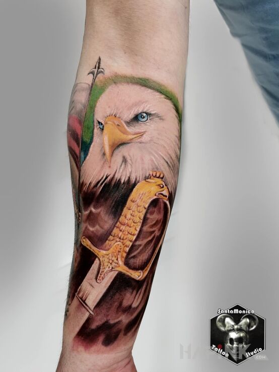 Tattoo Orzeł in animals motif and realistic style On the arm