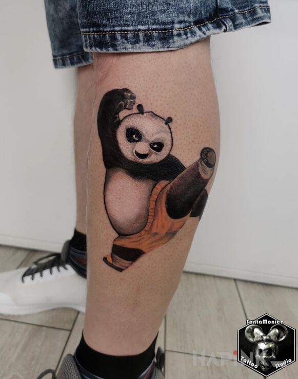 Tattoo Kung-fu panda in characters motif and cartoon / comic book style on the calf