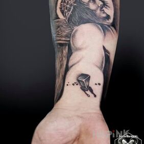 Tattoo Jesus on the forearm motif: characters style: realistic