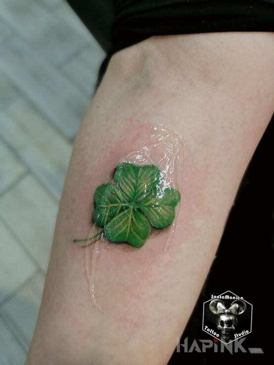 Tattoo Kończynka in colorful motif and realistic style On the arm