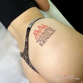 Tattoo 2003 on the buttocks motif: other style: minimalistic